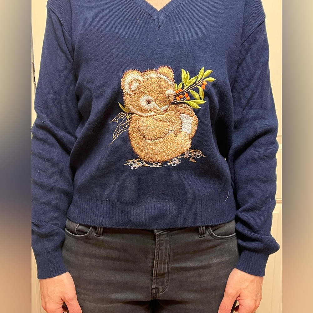 Vintage, quirky, navy blue v-neck sweater.